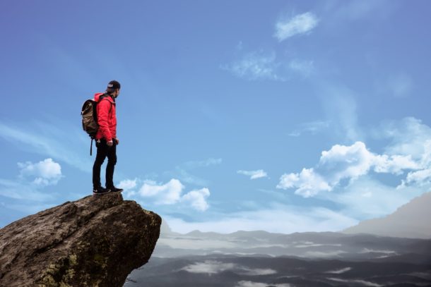 Man Standing on a cliff